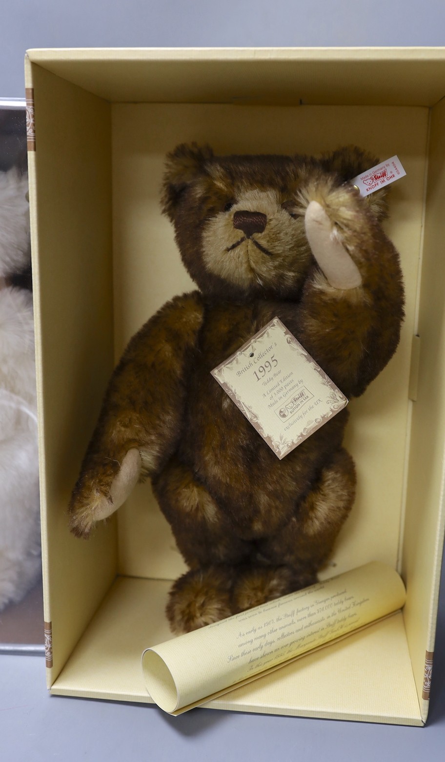 A white tag Steiff Muzzle teddy bear, 33cm, box/cert. with brown tipped British Collectors Bear, 1995, box/cert., Steiff Club Bear 2009, box 20cm and mini Steiff Bear April, box/label, 8cm